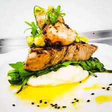 The fish—we use cod, but any flaky variety works—marinates in a mixture of lime juice, chili powder, and cumin that will become your standard. A Bay S Island Grill Restaurant Waikoloa Hi Opentable