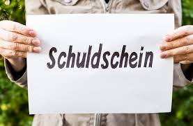 Der darlehensvertrag benennt namentlich schuldner und forderungsinhaber und schließt aus, dass die forderung an einen dritten gezahlt wird. Woman Is Holding A Paper With German Word Schuldschein Means Debt Finanzwelt