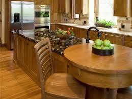 Modern breakfast bar featuring a stunning granite tabletop and a beautiful white finished wooden base. Kitchen Island With A Breakfast Bar Custom Kitchen Island Granite Kitchen Island Ikea Kitchen Island