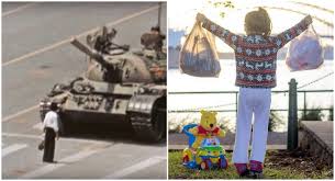 The tanks tried to go around the man, but he stepped back into their path, climbing atop one briefly. The Internet Reenacted The Tank Man Photo In Honor Of The Tiananmen Square Massacre Anniversary