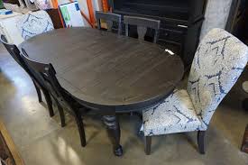 Save now with 10% off ellary rustic pine concrete topped trestle base dining table. Ashley Floor Model Dark Rustic Oval Farmhouse Dining Table With Extension 4 Matching Side Chairs A