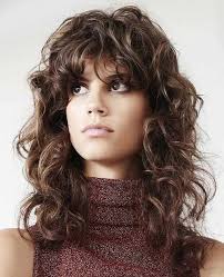 20 Curly Hairstyles With Bangs Long Hairstyles Hairstyles Curly Bangs Long Shag Hairstyles Long Shag Haircut Curly Hair Styles Naturally