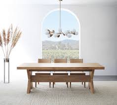 The transparent nature of glass often helps a room to look larger and its reflective surface adds light and brightness to the space. Modern Farmhouse Extending Dining Table Pottery Barn