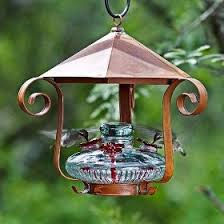 The base easily comes apart and reassembles for easy cleaning. Artistic Hummingbird Feeders