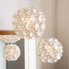It is well known to be a good indoor as well as outdoor decor raw. Capiz Flower Pendant Capiz Shell Chandelier Pendant Light Fixtures Decor