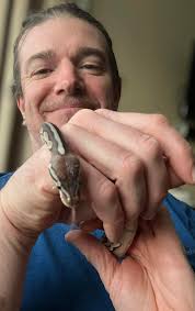 I never knew I could get this attached to a snake. She's the best!