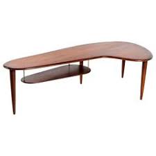 Once you've established a solid sofa for your living room, the coffee table is arguably just as important. Mid Century Modern Danish Teak Boomerang Coffee Table 1950s At 1stdibs