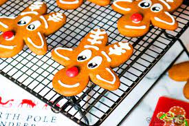 Pink craft paper to cover the background. Reindeer Gingerbread Cookies Upside Down Gingerbread Man Reindeer Cookies Big Bear S Wife