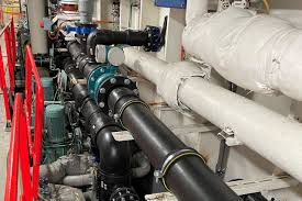 Industrial thermoplastic piping system detail representing chemical service routing and fittings.