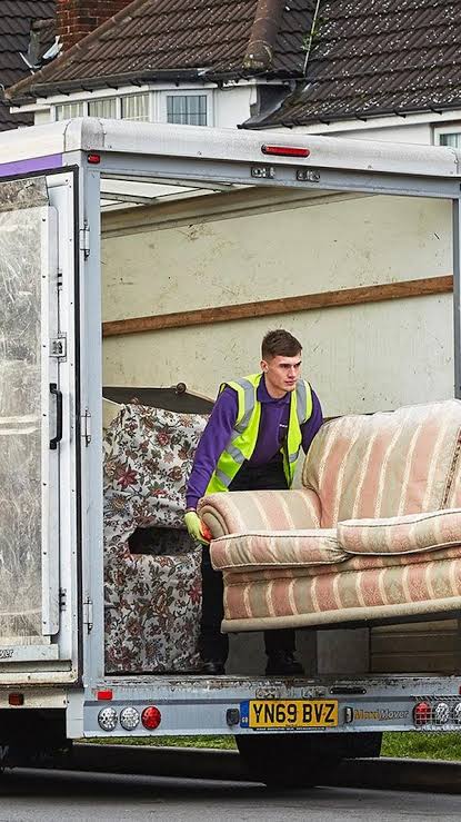  team collecting an old sofa as part of TFP Furniture Exchange in Mauritius