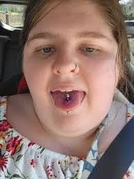 Got my tongue pierced for the third time. Chose an opal ball end :  r/piercing