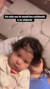 La Madrina Cuida A Su Ahijado