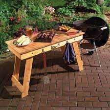 Grill wood cart (via popularmechanics) Transportable Fold Up Grill Table Diy Family Handyman