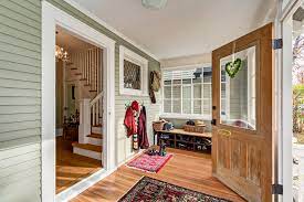 Add more living space to your home by turning an entryway into a cozy foyer. Sunroom With Soul Traditional Entry Calgary By Kon Strux Developments Houzz