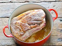 Brush off spice rub from meat and place pork in a deep roasting pan; Cider Braised Pork Shoulder The Seasoned Mom