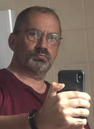 Hi, thanks for adding me, I'm not sure how to lean a three wheeler...DFxl  resting beside the road.