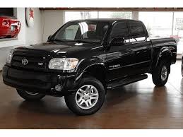 Hero nurse's free tundra gets 'hot' makeover to honor burnt original. 1st Gen Black Toyota Tundra Double Crew Cab With Running Boards Toyota Tundra Toyota Tundra Trd Toyota Trucks