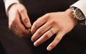 The 100 Best Finger Tattoos For Men Improb Wedding Band Tattoo Tattoo Wedding Rings Ring Tattoos
