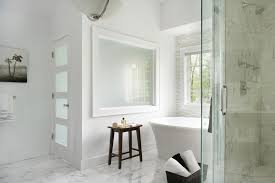 Crisp White Walls And Marble Floors Create A Clean Serene Feel In This Contemporary Bathroom A Freestanding Bathtub B With Images Free Standing Tub Free Standing Bath Tub