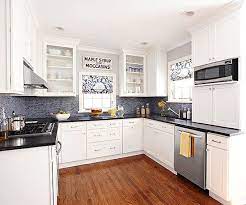 Note how the light bounces off every drawer, cabinet and countertop in the kitchen. Small White Kitchens Small White Kitchens Kitchen Design Small White Kitchen Remodeling