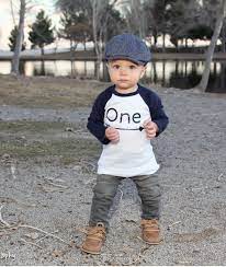 The blue bodysuit has orange accents at the shoulders and a playful monkey. Cute 1st Birthday Boy Outfits Uk Novocom Top