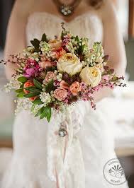 Whimsical pink and orange wedding bouquet. Pink Peach And Orange Bouquet