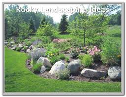 Rock garden ideas often incorporate a large number of stones. How To Keep Your Yard Looking Nice In The Winter Landscaping Lovers Landscaping With Boulders Landscaping With Rocks Rock Garden Landscaping
