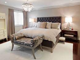 Most cozy bedroom decor ideas involve pops of color lots of throw pillows and a throw blanket to add warmth to the space. Cozy Luxury Luxurious Master Bedroom Large Space Chandelier Chocolate Dark Brown Beige Neutral Walls Large Tufted Diamond Headboard Ideas Zebra Pattern Animal Safari Decor Shop Room Ideas Shop Room Ideas