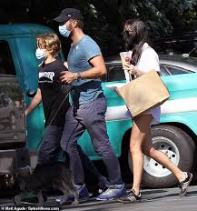 Coldplay frontman chris martin and fifty shades of grey star dakota johnson reportedly had a baby gender reveal party in early october 2018, according to tmz. Chris Martin And Dakota Johnson Enjoy Lunch With His Son Moses And Her Puppy Zeppelin Daily Mail Online