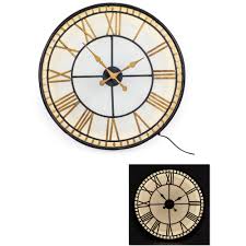 The case and flower pattern are made of wood in either light natural or grey, with a mirrored glass behind it. Large Black And Gold Back Lit Glass Westminster Wall Clock Back Lit Wall Clock Black And Gold Wall Clock