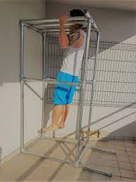 Chaise romaine avec rouleaux de blocage des jambes pour abdos. Concevoir Sa Propre Structure De Musculation Assemblage Direct