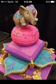 She and her husband met while working in kuwait and were able to travel extensively this design is a perfect example of how you can personalize a baby shower. The Most Perfect Baby Shower Cake I Would Be The One With A Moroccan Themed Baby Shower With Traditional Elephant Cakes Indian Cake Creative Wedding Cakes