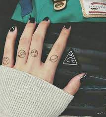 Tiny Finger Tattoos Planet Tattoos Tattoos Finger Tattoos