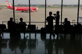 airasia transfers some kuala lumpur singapore slots to long