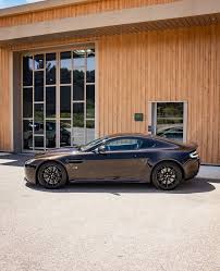 Image result for Marron Black 2017 Aston Martin