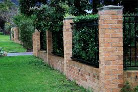 Wood fence with brick columns. 13 Brick Fence And Column Designs A Quick Planning Guide