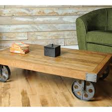 They do, however, come in so many different designs such that selecting the best & most unique coffee table can be challenging. Rothbury Re Engineered Industrial Coffee Table With Wheels Coffee Tables Tables Furniture
