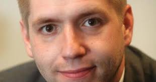 Absentee county official's salary could be slashed to $1