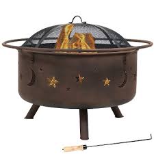 The wicker collection includes two chairs, two ottomans, an accent table, a fire pit, and cushions. Fire Pits Target