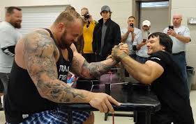 win at arm wrestling and avoid injury