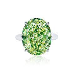 A 20 02 Carat Fancy Light Greenish Yellow Diamond Ring Set With An Oval Shaped Fancy Light Greenish Yellow Diamond Rings Yellow Diamond Vintage Diamond Rings