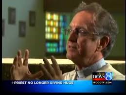 Priest stops hugging kids during mass