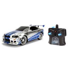 The car gets disabled after brian wins the race by a los angeles police officer. Jada Toys Fast And Furious 1 24 Scale Rc Nissan Skyline Gtr R34 Walmart Com Walmart Com