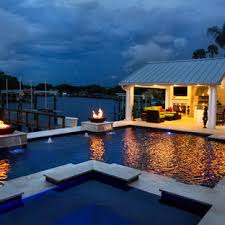 A great room with media center and. 75 Beautiful L Shaped Pool House Pictures Ideas January 2021 Houzz