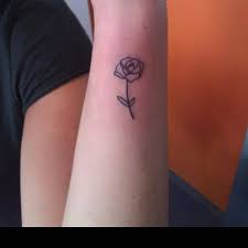 Another simple and tiny black rose tattoo on the wrist. 10 Simple Rose Tattoos Ideas Rose Tattoos Tattoos Simple Rose Tattoo