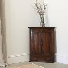 Check out our oak corner cabinet selection for the very best in unique or custom, handmade pieces from our furniture shops. John Stephens Georgian Oak Corner Cupboard