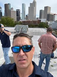 Walking another modified roof in Houston with a customer.