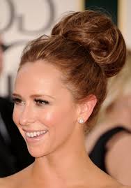 Next, place the brush under the section and then pull the brush and hair forward around your face (this curving motion creates body). Classic Full Volume High Bun Updo Jennifer Love Hewitt Hair Hairstyles Weekly