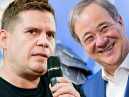 Laschet steht lange mit ernster miene im hintergrund, sein lachen dauert nur rund 20 sekunden, später verschwindet er aus dem bild. Kampagnenchef Von Olaf Scholz Laschet Ist Ein Gummi Mann Politik