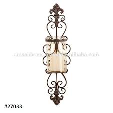 Artisanal wall mount candleholders if you are looking for a smooth way to add your interiors a bit of the classic or rustic appeal, check out this set of wall mounted candle holders. Wrought Iron One Light Wall Sconce Candle Holder Buy Wrought Iron One Light Wall Sconce Candle Holder New Style Wall Candle Holder Sconce Metal Tealight Wall Sconce Product On Alibaba Com